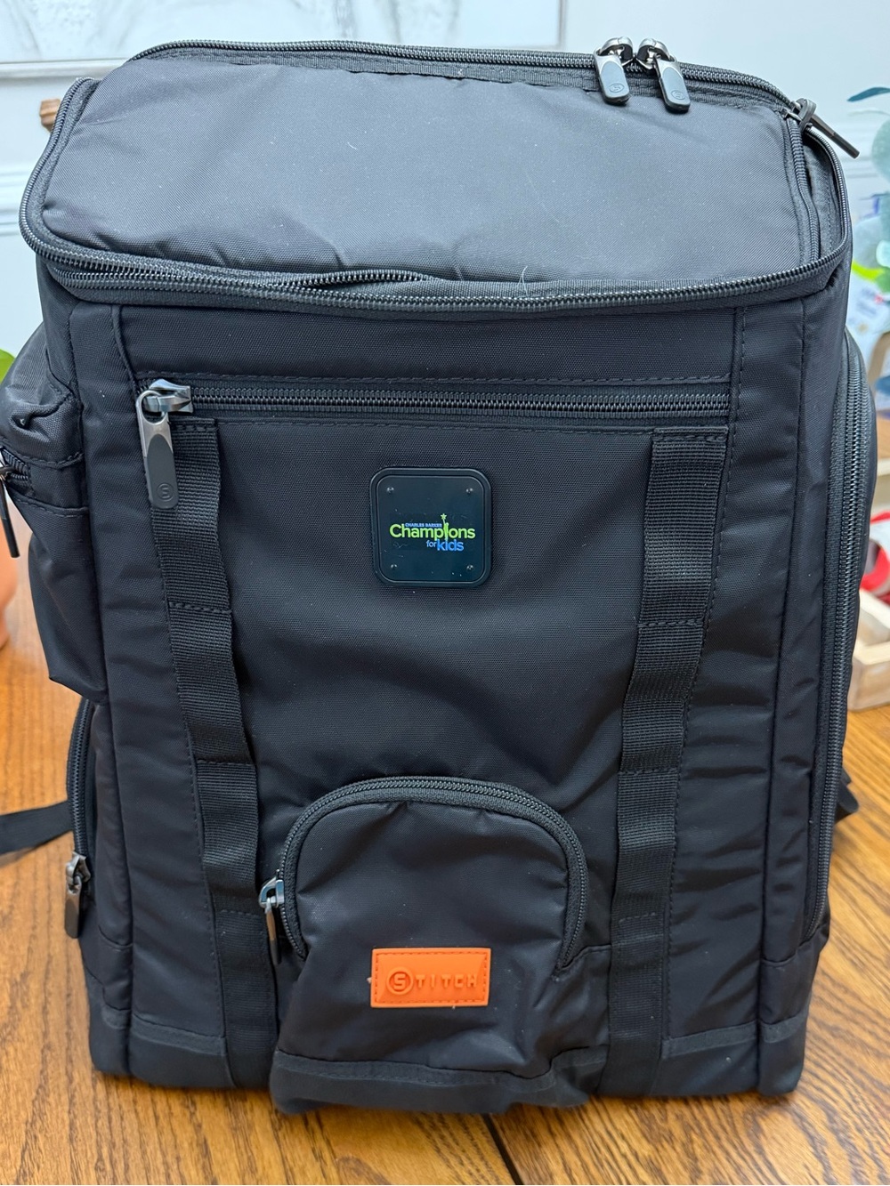 Champions for Kids Black Utility Backpack with Front Pocket and Padded Straps